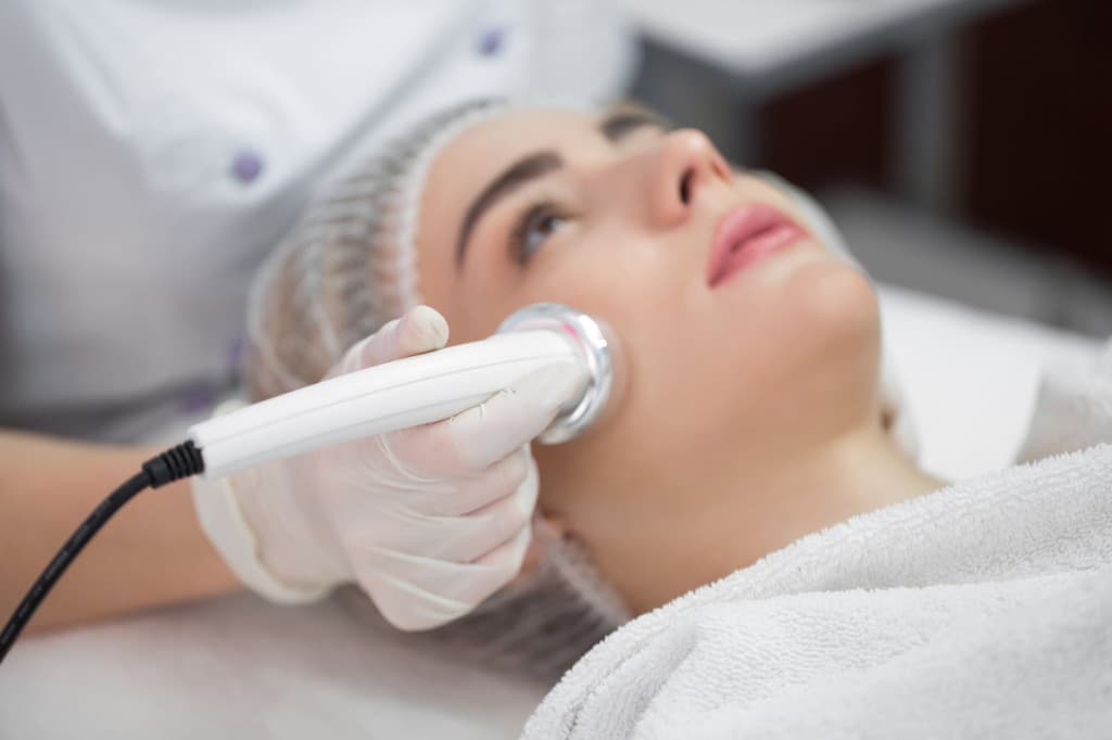 In-clinic facial treatment at Oak & Sage Wellness Center in Edmond
