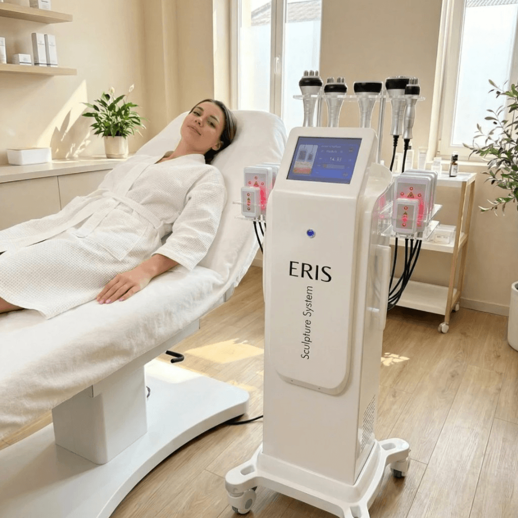 Client relaxing beside the ERIS Sculpture System during a skin tightening session at Oak & Sage Wellness Center